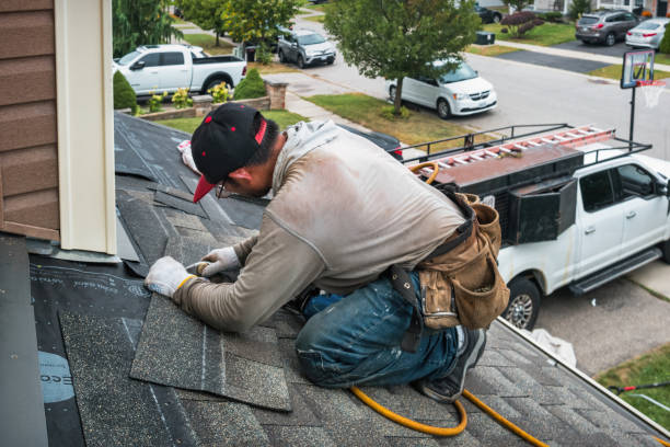 Professional Roofing technician working in Decatur, IL